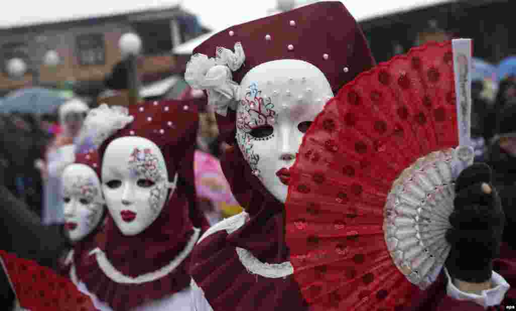 Local villagers wearing homemade costumes parade during a carnival celebration marking the Orthodox St. Vasilij Day in the village of Vevcani, about 170 kilometers from the Macedonian capital, Skopje, on January 13. (epa/Georgi Licovski)