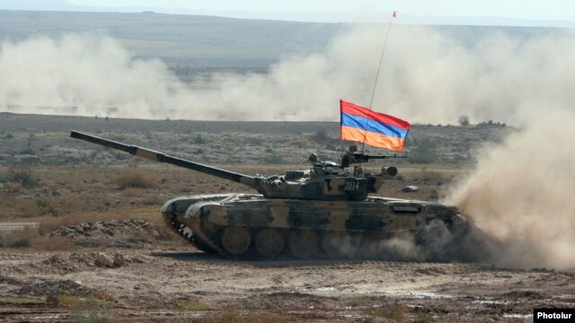 Armenia - An Armenian battle tank takes part in CSTO military exercises at the Marshal Bagramian shooting ground, 19Sep2012.
