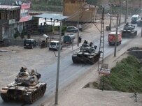 Turkish forces moving toward the Iraqi border on May 31 (AFP)
