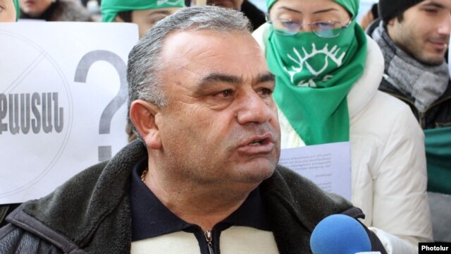 Armenia - Rafik Atayan, mayor of Kajaran village, takes part in an environmental protest in Yerevan, 29Dec2011.