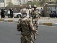 Iraqi soldiers on the streets of Baghdad on June 23 (epa)