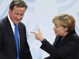 Dejvid Kamerun i Angela Merkel