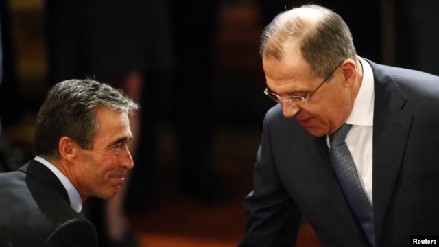 Russian Foreign Minister Sergei Lavrov (right) and NATO Secretary-General Anders Fogh Rasmussen meet at the 49th Conference on Security Policy in Munich on February 2.