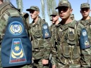 Kazakhstan - Members of the Azerbaijan Army pass in review during CENTRASBAT (Central Asian Peacekeeping Battalion) 2000 opening ceremonies on September 13th, 2000