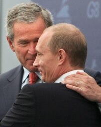 Bush (left) was skeptical about Russian democracy under Putin (file photo) (epa)