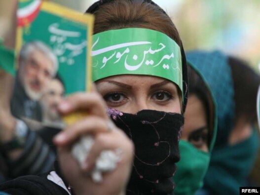 A supporter of Iranian presidential candidate Mir Hossein Musavi in Tehran, June 2009