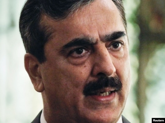 Pakistani Prime Minister Yusuf Raza Gilani speaks during an interview with Reuters at his residence in Islamabad on September 27.