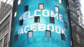 A monitor shows a welcoming message for Facebook's listing on the Nasdaq Marketsite prior to the opening bell in New York on May 18.