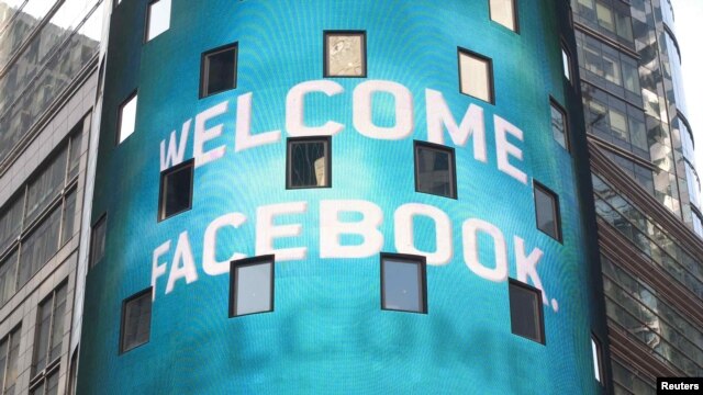 A monitor shows a welcoming message for Facebook's listing on the Nasdaq Marketsite prior to the opening bell in New York on May 18.