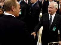 Putin (left) with U.S. Defense Secretary Robert Gates in Munich on February 10 (epa)