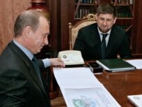 Kadyrov (right) meeting with President Putin in May (epa)