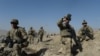 Explainer: The Thorny Issue Of Status Of U.S. Forces In Afghanistan