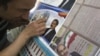 Iranians Told To Vote, Don't Vote, In Next Week's Election