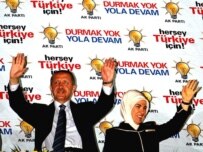 Prime Minister Recep Tayyip Erdogan and his wife greet supporters in Ankara on July 22 (epa)