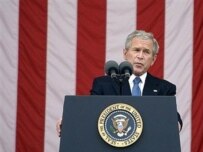 Bush speaking today at Arlington Cemetery (AFP)