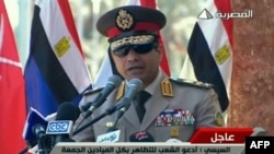 A TV grab shows army chief General Abdel Fattah al-Sisi giving a live broadcast on July 24 calling for public rallies this week to give him a mandate to fight "terrorism and violence."