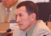 Slain deputy Tynychbek Akmatbaev in parliament (RFE/RL)
