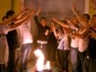 Bosnian Muslims celebrate at the war memorial in Sarajevo after the announcement of Karadzic\'s arrest