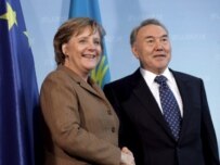 Kazakh President Nursultan Nazarbaev (right) met with German Chancellor Merkel in Berlin last month (epa)