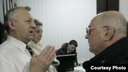 Police search the offices of the "Narodnaya volya" newspaper in Minsk on March 16.