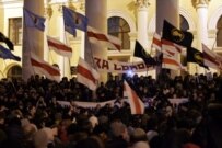 Protesters gathered in the early evening and responding to calls from opposition leaders to stay all night, are preparing tents (RFE/RL)