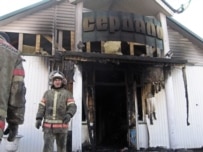 The offices of the state-owned 'Serdalo' newspaper were set on fire following the demonstration (AFP)