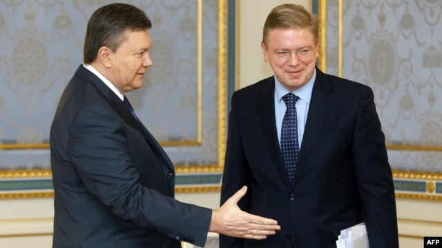 Ukrainian President Viktor Yanukovych (left) met with EU Enlargement Commissioner Stefan Fuele in Kyiv in early February.