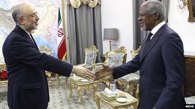 Iranian Foreign Minister Ali Akbar Salehi (left) greets UN/Arab League Syria envoy Kofi Annan in Tehran on April 11.