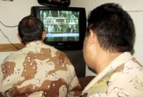 Iraqi Army officers watching the trial of deposed President Saddam Hussein in June 2006 (epa)