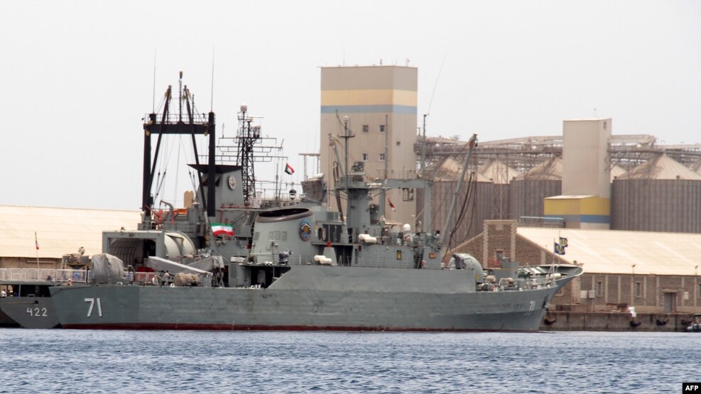 the Iranian warships Alvand (right) and Bushehr are seen docked for refueling in Port Sudan in May 2014.