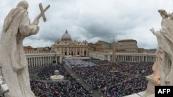 The crowd gathered on St. Peter's Square in the Vatican for the dual canonization ceremony on April 27.