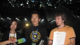 The winning team in Kazakhstan's Youth Art Fest live action short film competition included film operator Tiantian Kian of China (left), director Vladimir Sim of Kazakhstan (center) and editor Roman Sukhosyr, also of Kazakhstan.