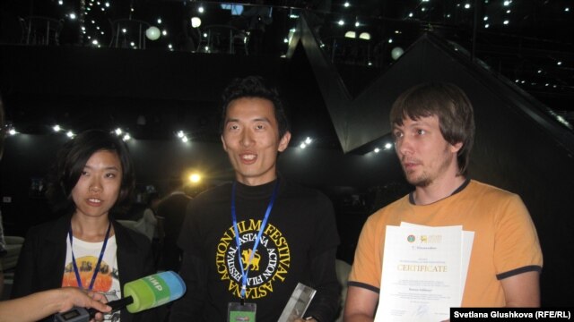 The winning team in Kazakhstan's Youth Art Fest live action short film competition included film operator Tiantian Kian of China (left), director Vladimir Sim of Kazakhstan (center) and editor Roman Sukhosyr, also of Kazakhstan.