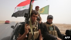 عدد من عناصر الحشد الشعبي شمال بيجي