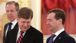 Russian President Dmitry Medvedev (right), Foreign Minister Sergei Lavrov (left), and U.S. Ambassador Michael McFaul at the Kremlin in February