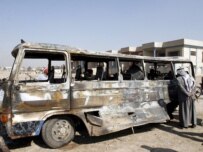 This bus was struck by a suicide bomber in Baghdad today (epa)