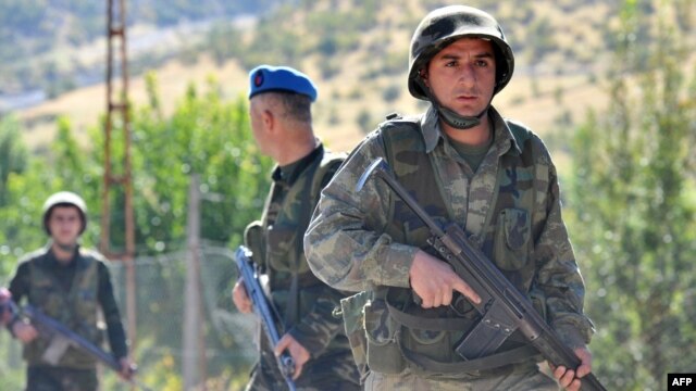 Turkish soldiers patrol on a road near the village of Uludere in the southeastern province of Sirnak, 15 kilometers from the Turkish-Iraqi border, in October.