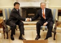 Bush (right) with Musharraf in the Oval Office on September 22 (epa)