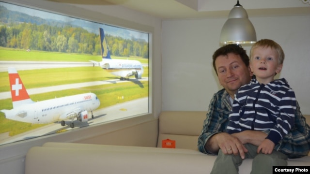Oleksandr Ulanovych and his son Sasha, pictured inside one of Ulanovych's Wings (Krila) fast-food restaurants in Kyiv. Ulanovych believes Yulia Tymoshenko "betrayed millions of people" who voted for her.