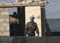 A member of the UN force already in Lebanon patrolling along the border with Israel this morning (epa)