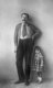 Writer Maksim Gorky posing with his granddaughter in 1928