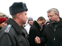 Supporters of opposition presidential candidate Alyaksandr Milinkevich (right) were reportedly celebrating his candidacy when they were arrested (file photo) (RFE/RL)