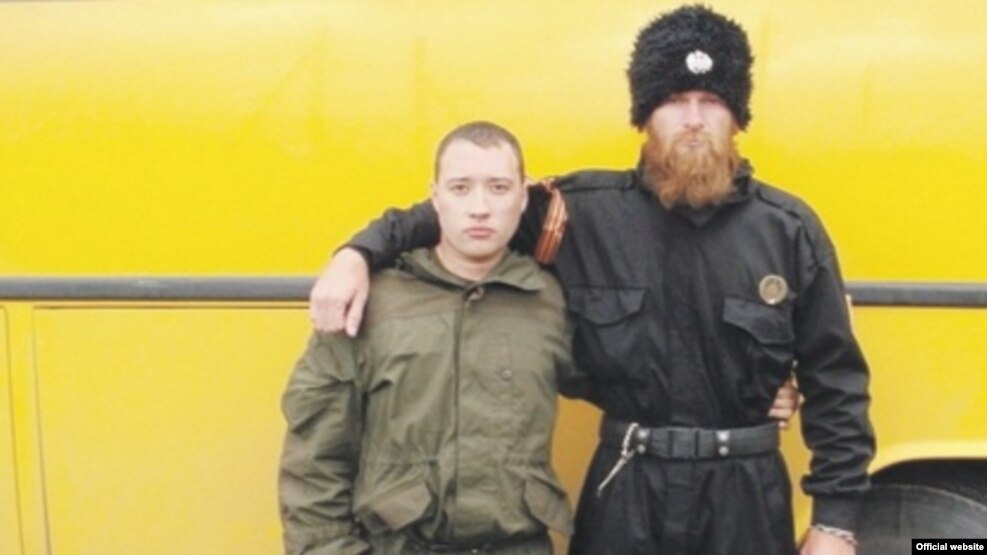 The head of the nationalist Serbian Wolves organization, Aleksandar Sindelic (right), has been recorded telling a political scientist that he had ties with the Russian Defense Ministry (file photo).