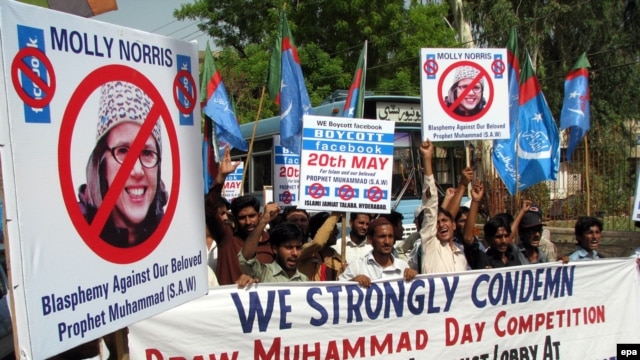 Demonstrators in Hyderabad, Pakistan on May 19 hold banners and shout sloagans against the "Everybody Draw Muhammad Day" Facebook event.