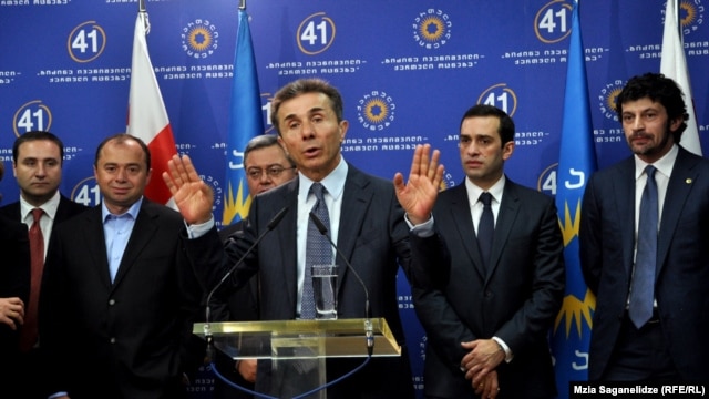 Georgian Dream leader Bidzina Ivanishvili (center) presents his nominees for a new cabinet of ministers, in Tbilisi on October 8.