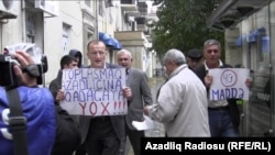 Azerbaijani opposition activists protested the amendments in Baku on November 2.