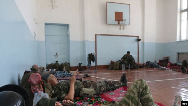 Kyrgyz police were deployed in a school in Osh on June 21.