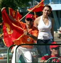 Pro-independence supporters wave flags in the Montenegrin capital, Podgorica, on May 18 (epa)