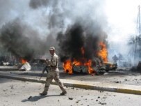 The number of car bombs, such as this near the entrance to the Green Zone, has reportedly gone down (epa)