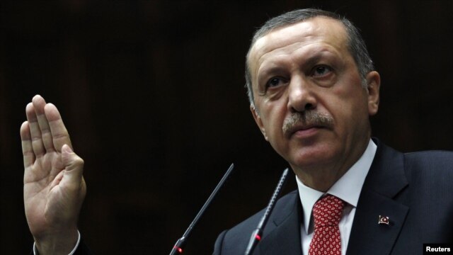 Turkish Prime Minister Recep Tayyip Erdogan, addressing members of parliament on June 26, said the Turkish military will respond to any future violations of its border by military units from Syria.